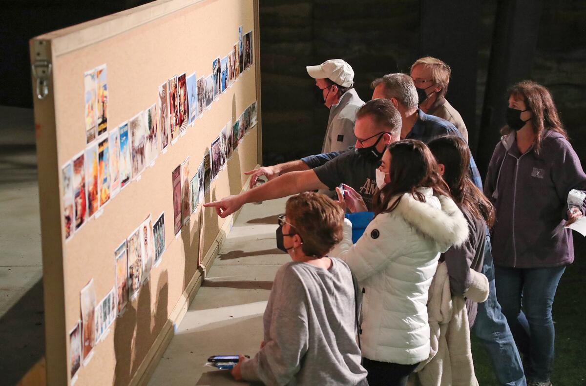 Prospective cast members look over the tableauxs chosen for the Pageant of the Masters 2022 show, "Wonderful World."