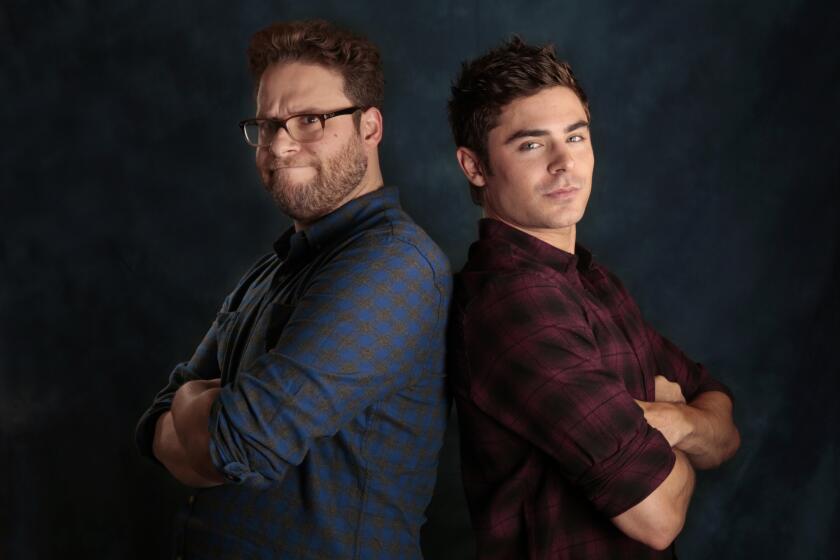 Seth Rogen, left and Zac Efron, star in the new movie "Neighbors."