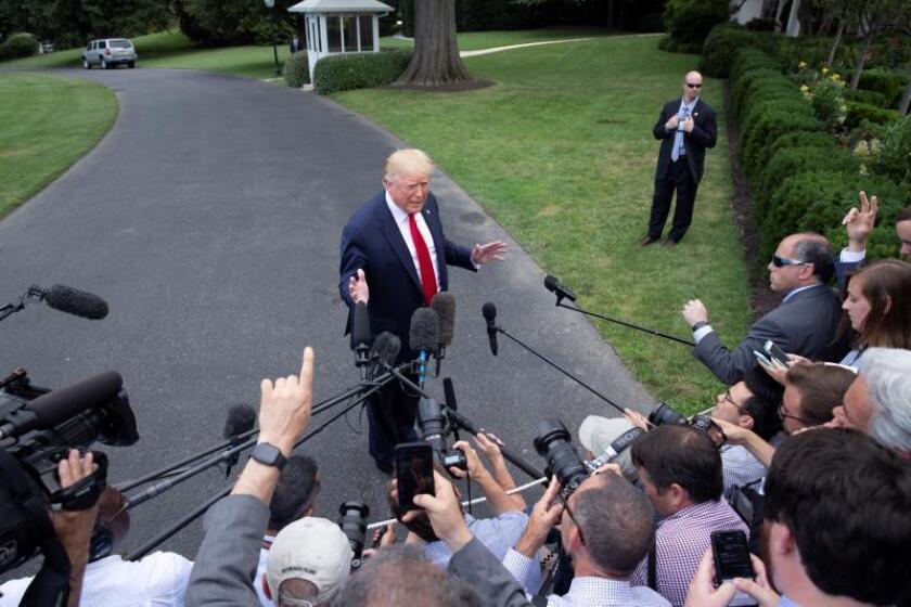 US President Donald J. Trump responds to questions from members of the news media before departing the South Lawn of the White House by Marine One, in Washington, DC, USA, 17 July 2019. EFE/EPA/Michael Reynolds