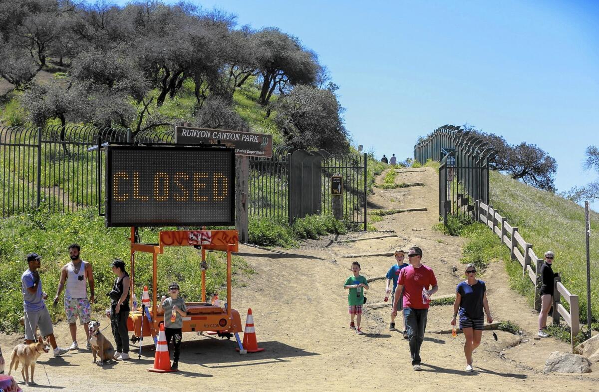 Runyon Canyon Park closed to the public for four months on April 1. The city had planned to build a basketball court on a trail during the closure.