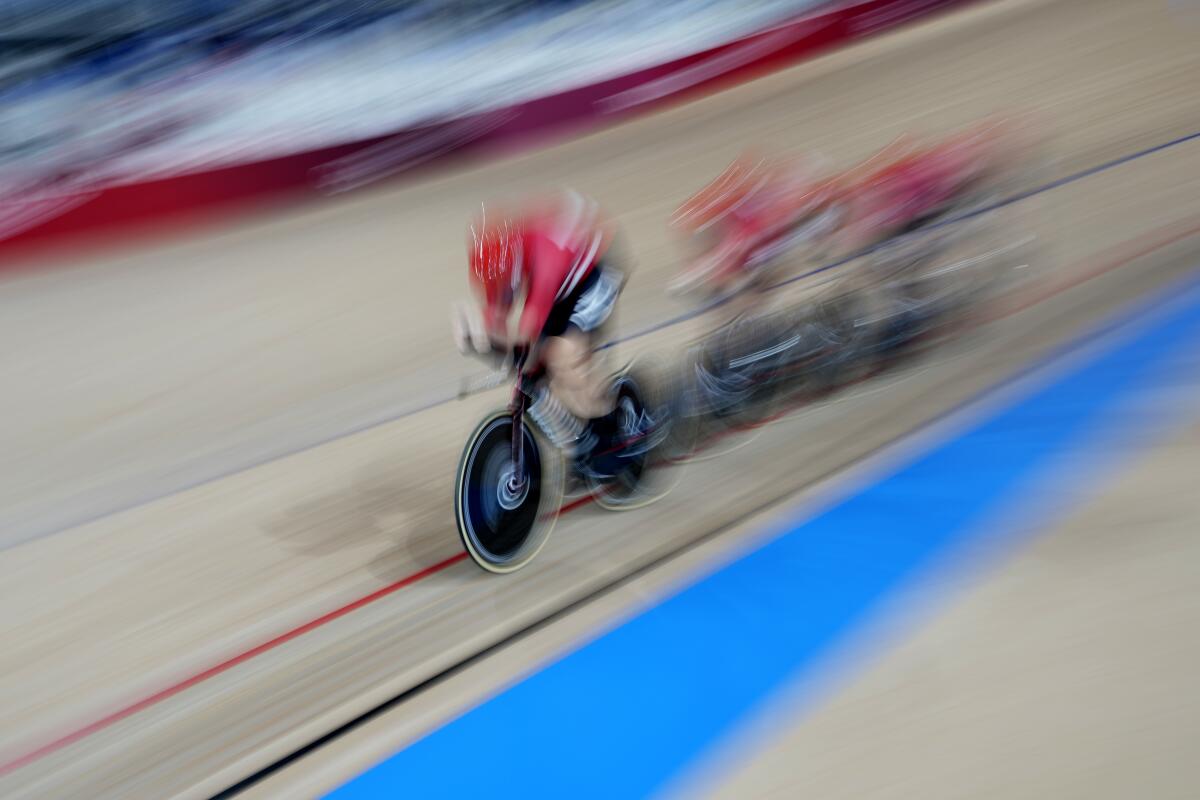 Team Denmark competes during the track cycling men's team pursuit at the 2020 Summer Olympics, Monday, Aug. 2, 2021, in Izu, Japan. (AP Photo/Christophe Ena)