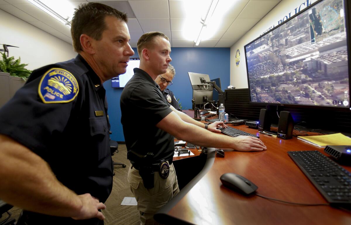 From left: Chula Vista Policemen Don Redmond, Kyle Roberts and Lt. Gino Grippo recently used a drone to investigate a report of domestic violence in the department's Drone First Responder Operations Center.