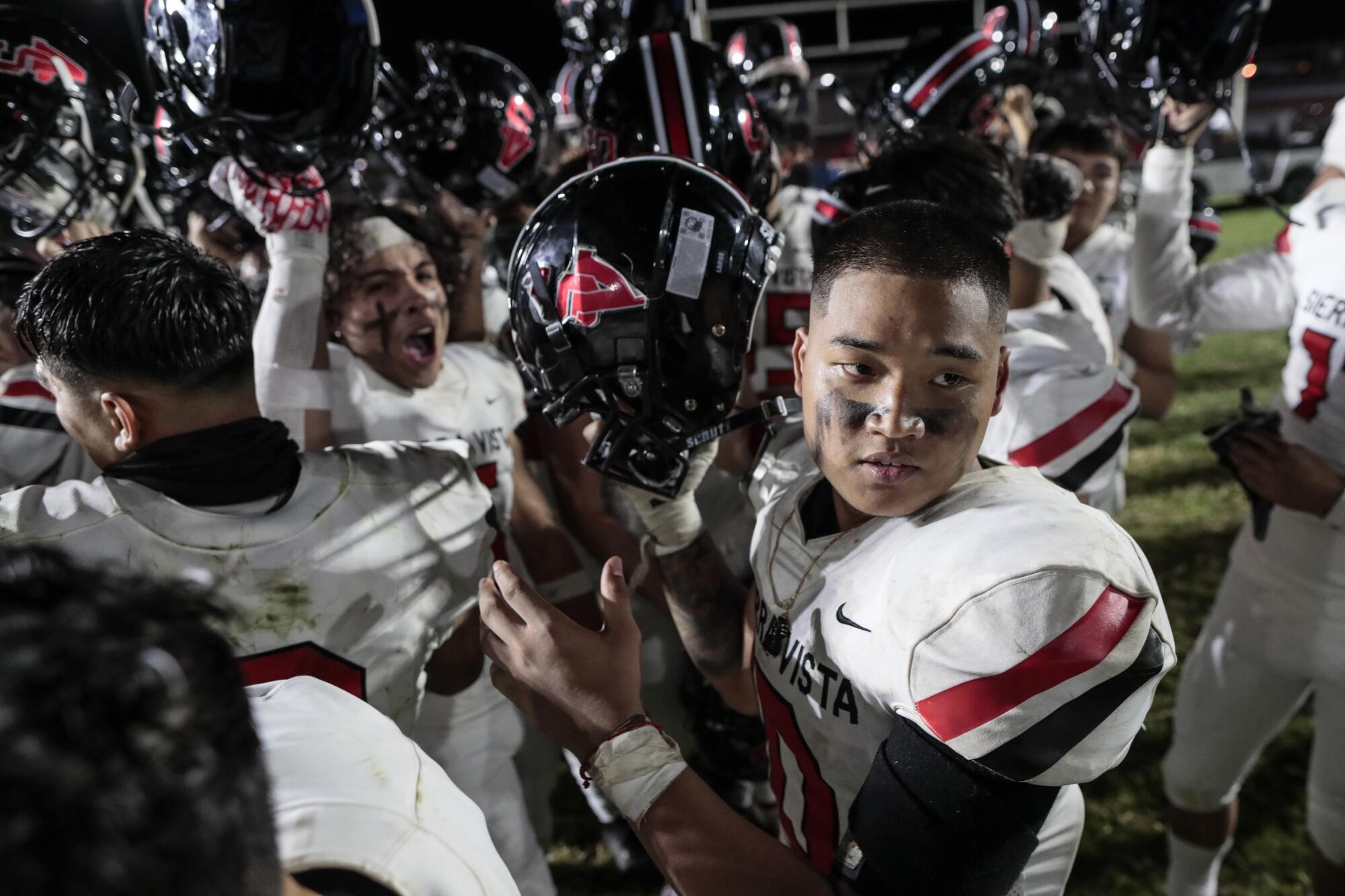 Johnny Sen celebrates a win over Cerritos High.