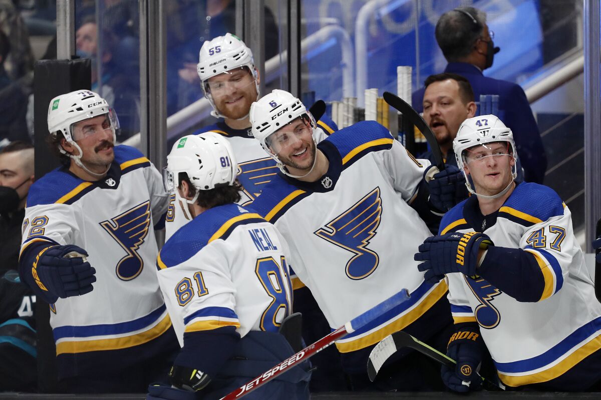St. Louis Blues left wing James Neal (81) is congratulated for his goal during the second period of the team's NHL hockey game against the San Jose Sharks on Thursday, Nov. 4, 2021, in San Jose, Calif. (AP Photo/Josie Lepe)