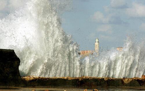 Battering waves A wave breaks against Havana's Malecon on Oct. 26, damaged after the battering of Huricane Wilma last weekend. Although Cuba lies in the path of many Caribbean hurricanes, storm surges rarely top Havana's stone sea wall, the Malecon.