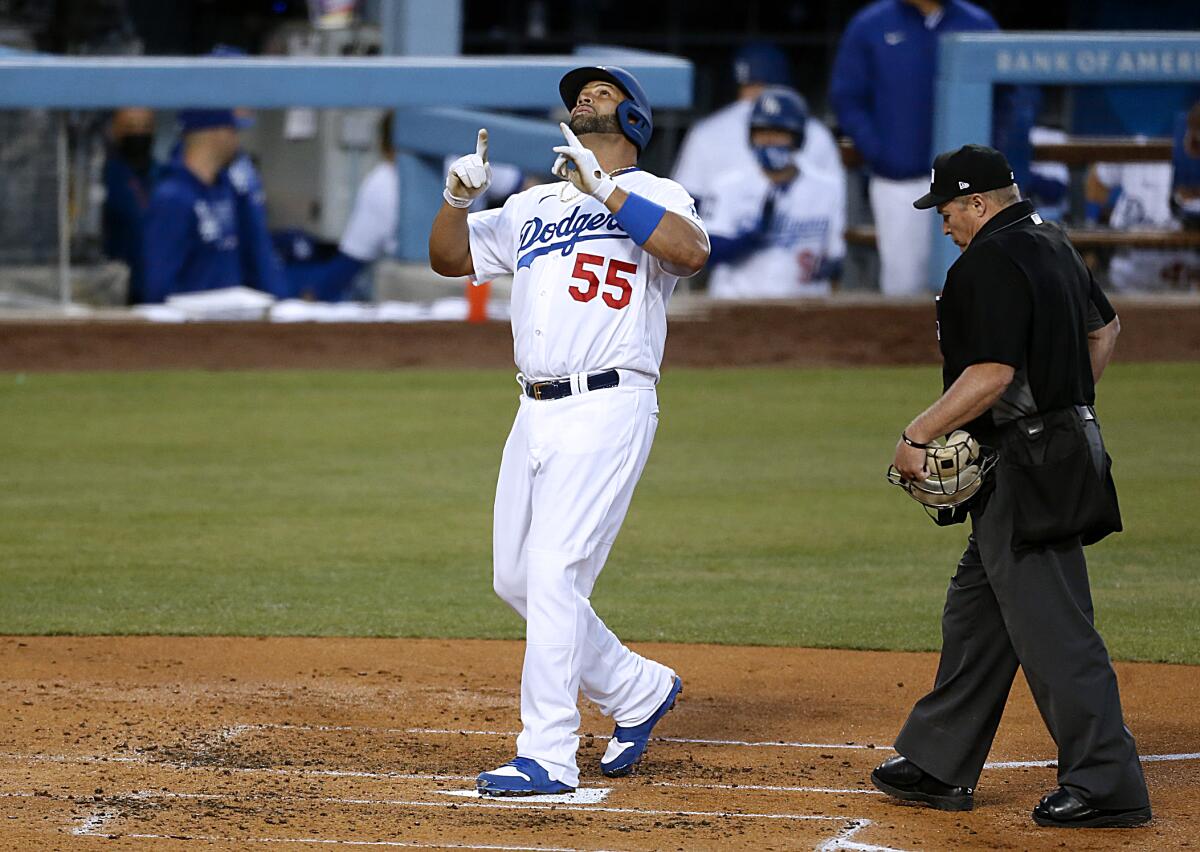 Dodgers' Albert Pujols homers.