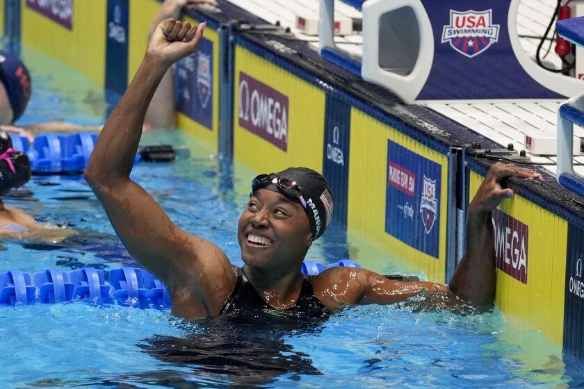 Simone Manuel reacts after winning the Women's 50 freestyle finals Sunday, June 23, 2024.