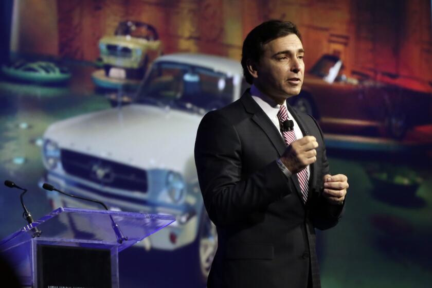 Ford Motor Company has confirmed it will replace outgoing Chief Executive Alan Mulally with former Chief Operating Officer Mark Fields, seen here speaking at the 2014 International Auto Show in New York.