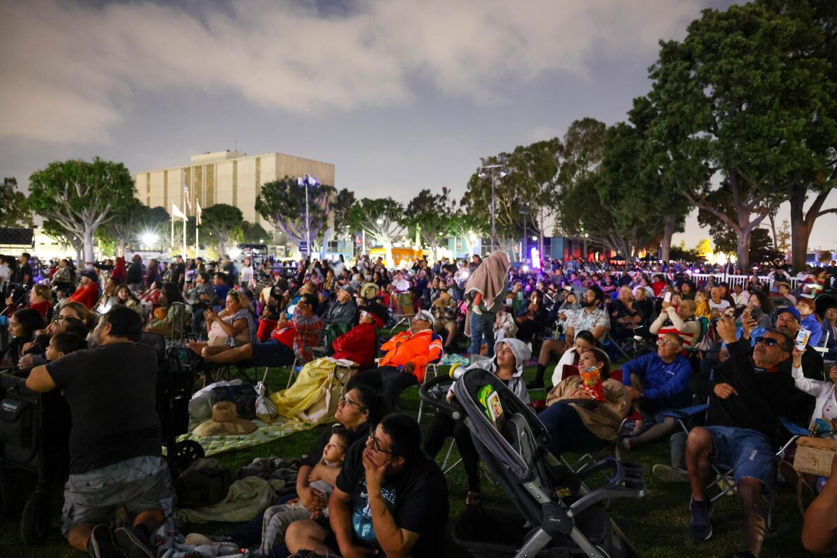 Crowd takes in the fireworks in Norwalk.