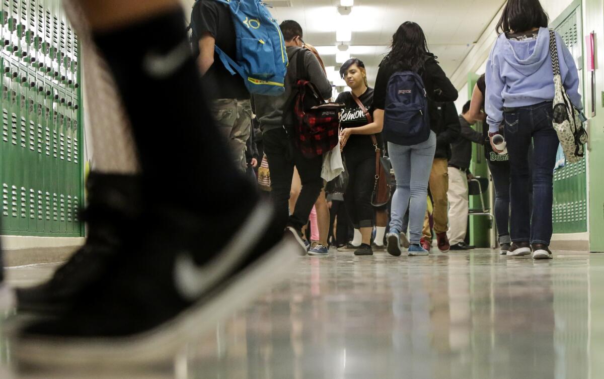 Students walk to class at Belmont High School. Los Angeles Unified was among the winners and will receive up to $15 million in grants from the California Career Pathways Trust.