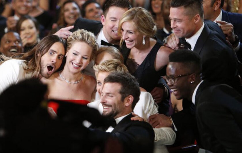 Ellen DeGeneres shoots for a retweet record with an Oscar group selfie and easily smashes the current record.