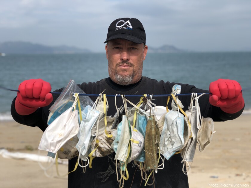 masks wash up on the beach