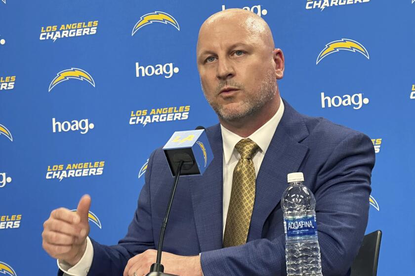  Chargers general manager Joe Hortiz answers questions during his introductory news conference.