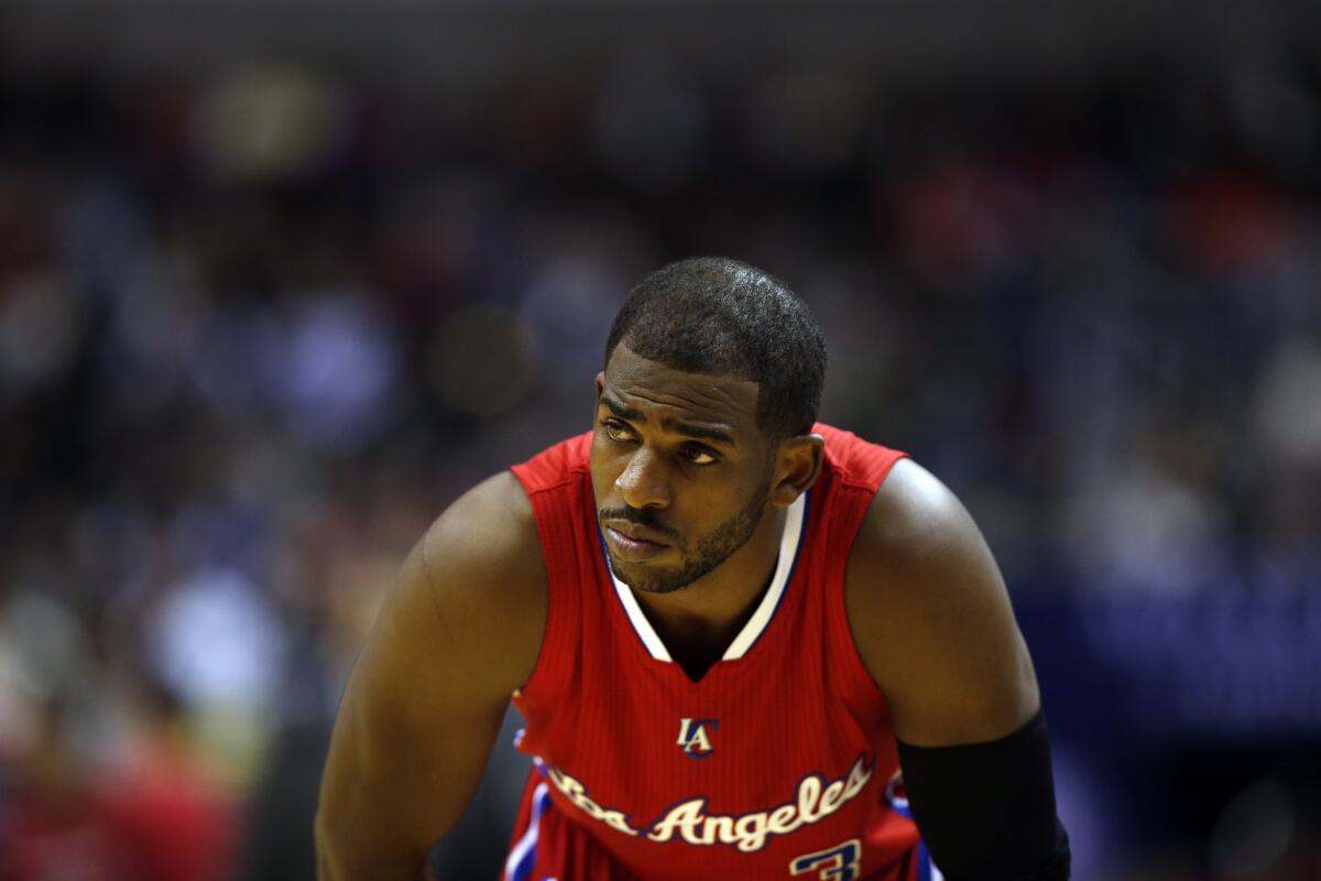 Chris Paul pauses during a Clippers road game last week against the Washington Wizards.