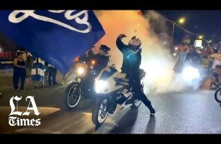 Dodgers fans celebrate at Dodgers Stadium and Echo Park