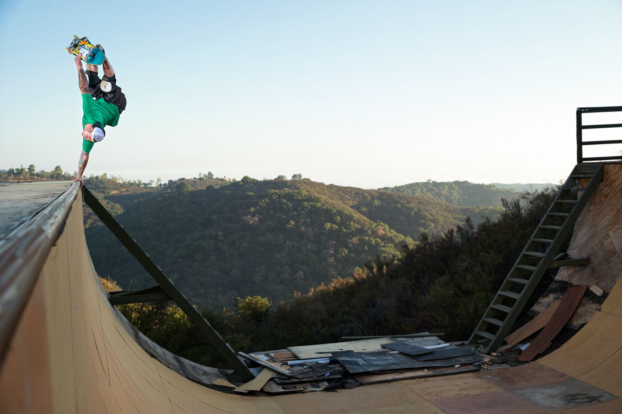 Jeff Grosso performs a straight-legged invert during the Vans Propeller Vert Session in Malibu on Oct. 12, 2014.