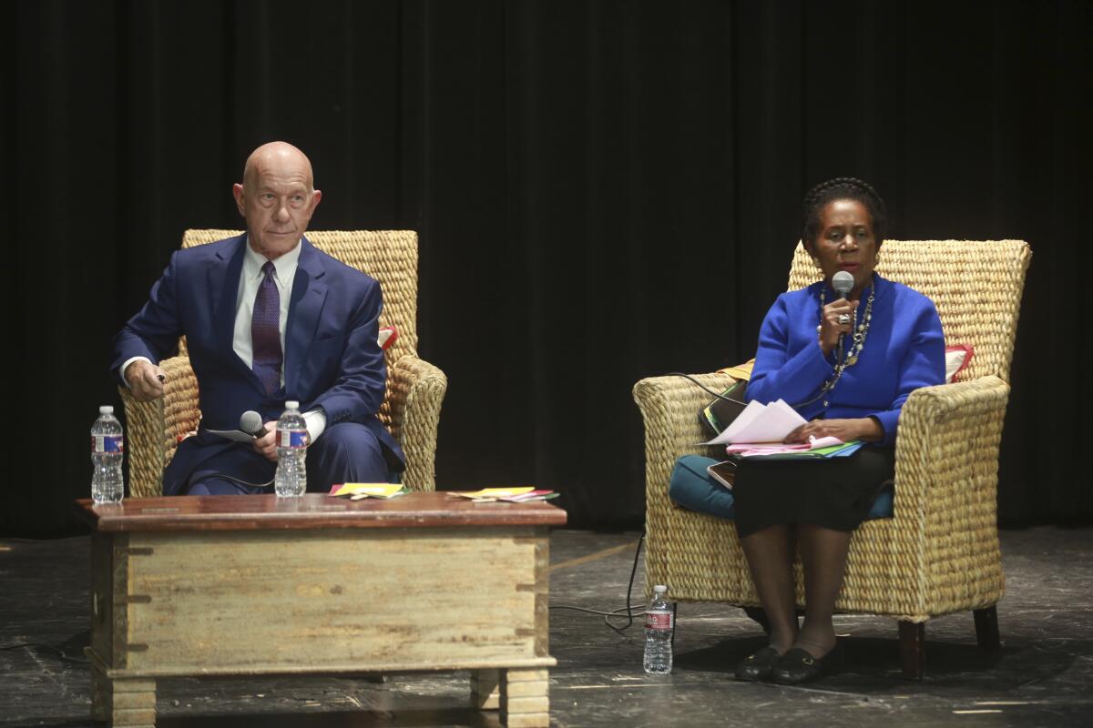 John Whitmire and Sheila Jackson Lee speak at a mayoral forum.