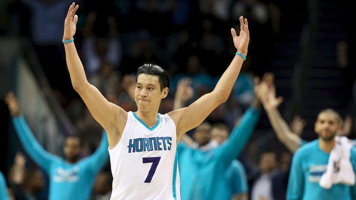 Charlotte's Jeremy Lin reacts after making a basket against the San Antonio Spurs on March 21, 2016.