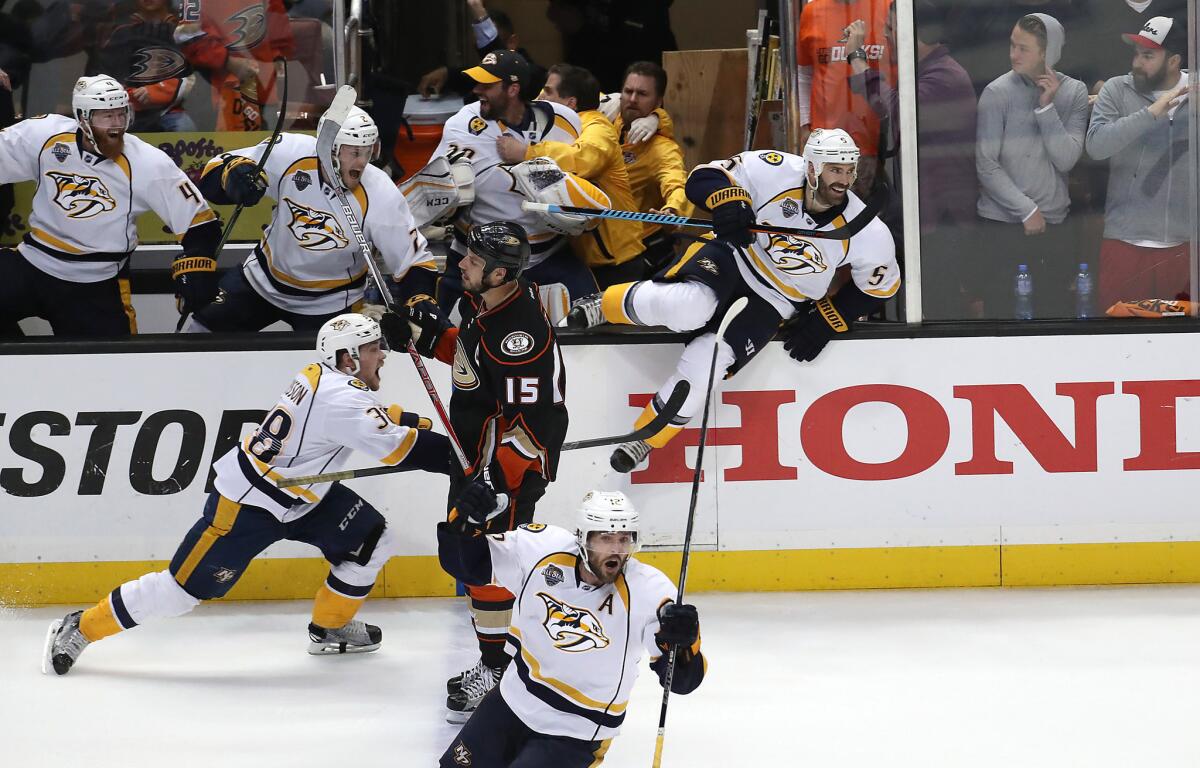 Ducks captain Ryan Getzlaf skates off in defeat as the Predators swarm to the ice in a 2-1 win in Game 7.