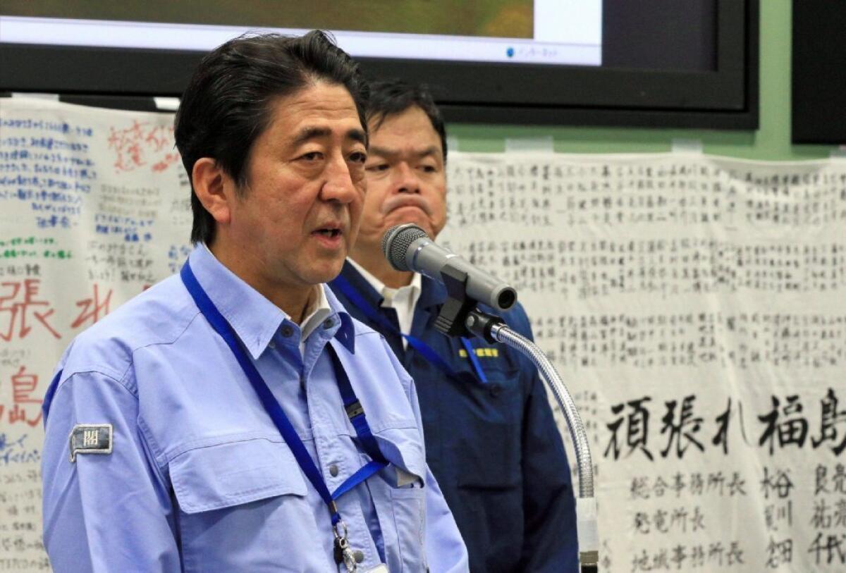 Japanese Prime Minister Shinzo Abe ordered the scrapping of two more reactors at the Fukushima nuclear plant on Thursday.