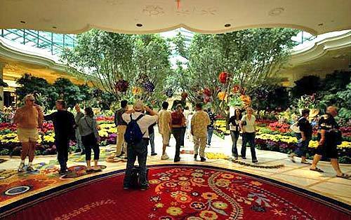 The Wynn Las Vegas' atrium, with marble floors inlaid with mosaics and decorative swirls in the carpets, lets some natural light flow into the casino itself.