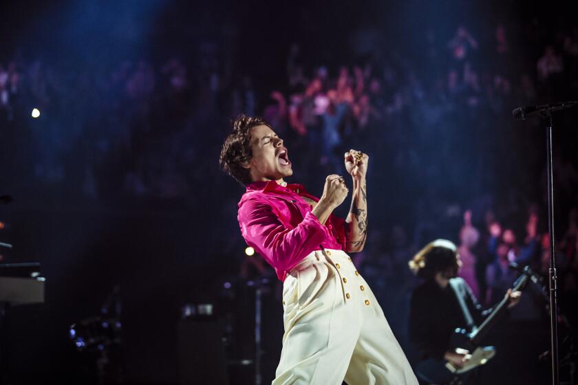 Harry Styles in concert Friday night, Dec. 13, 2019, at the Forum. Credit: Helene Pambrun