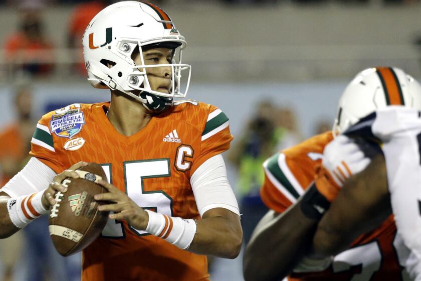 Miami quarterback Brad Kaaya (15) prepares to pass from the pocket against West Virginia in the Russell Athletic Bowl on Wednesday.