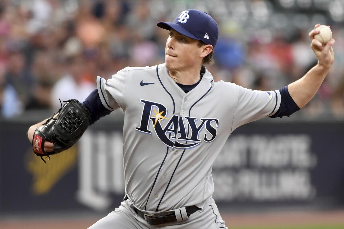 Tampa Bay Rays starting pitcher Ryan Yarbrough delivers against the Baltimore Orioles in the first inning of a baseball game, Friday, Aug. 6, 2021, in Baltimore. (AP Photo/Will Newton)