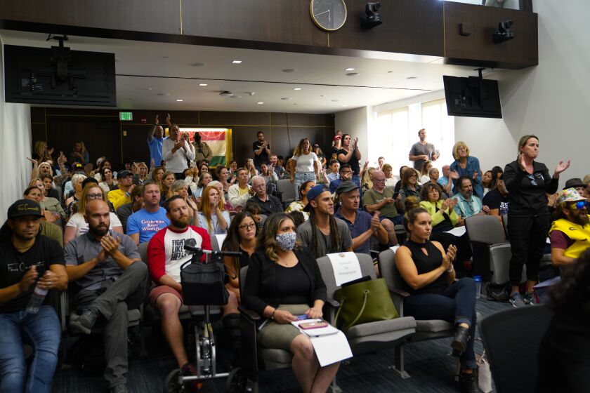 San Diego, CA - August 31: On Tuesday, Aug. 31, 2021 in San Diego, CA., at San Diego County Administration meeting, the audience responds during public comments supporting a no vote on Agenda Item 19. The board was voting on “Declaring health misinformation a public health crisis.” (Nelvin C. Cepeda / The San Diego Union-Tribune)