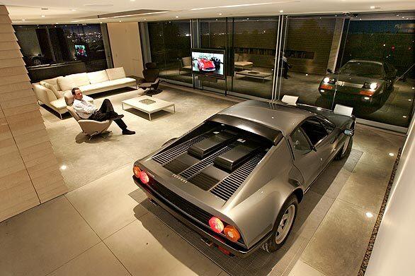... a flat-screen TV on tracks that can traverse the length of the room. "People in L.A. care so much about their cars and then the cars wind up stuck out in garages," says Schubert, whose garage truly brings the car into the living space. Back to L.A. at Home design blog