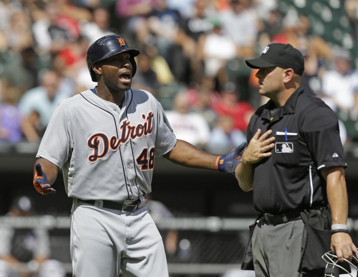 Torii Hunter argues a call with home plate umpire Scott Barry in the seventh inning.
