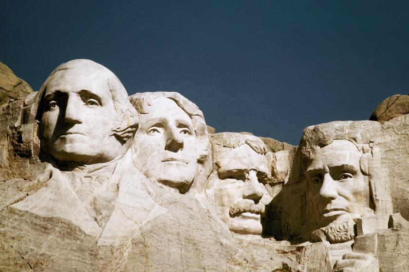 FILE - In this undated file photo, Mount Rushmore is shown in South Dakota. From left are George Washington, Thomas Jefferson, Teddy Roosevelt and Abraham Lincoln. The Partners in Preservation Campaign is asking the public to vote on 20 historic sites, including one at Mount Rushmore, that are vying for $2 million in preservation funding. The project at Mount Rushmore seeks $250,000 to restore structural elements of the Borglum View Terrace, where Rushmore sculptor Gutzon Borglum's original studio stood. (AP Photo, File)