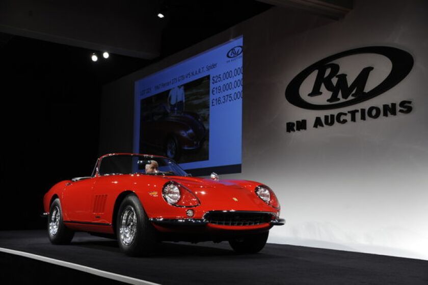 The Ferrari 275 GTB/4*S N.A.R.T. Spider on the auction block Saturday night as it sells for $27.5 million (including commission), a world record for a non-race car sold at auction.