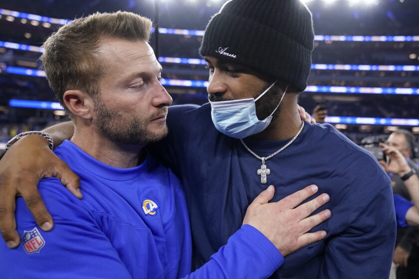 Rams head coach Sean McVay celebrates with Robert Woods after the NFC championship game.