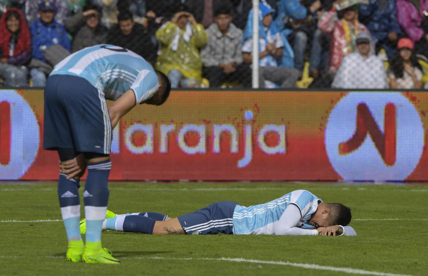 Argentina's Marcos Rojo (R) and Mateo Musacchio react during their 2018 FIFA World Cup qualifier football match in La Paz, on March 28, 2017. / AFP PHOTO / JUAN MABROMATAJUAN MABROMATA/AFP/Getty Images ** OUTS - ELSENT, FPG, CM - OUTS * NM, PH, VA if sourced by CT, LA or MoD **