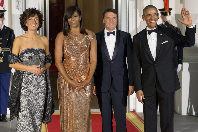 President Barack Obama and first lady Michelle Obama welcome Italian Prime Minister Matteo Renzi and his wife, Agnese Landini, for a state dinner at the White House on Oct. 18, 2016.