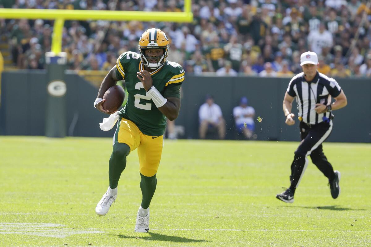 Green Bay Packers quarterback Malik Willis (2) runs against the Indianapolis Colts.