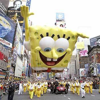 The SpongeBob SquarePants balloon comes to a stop to let traffic through at 42nd Street and Broadway in Times Square during the 78th Annual Macy's Thanksgiving Day Parade.