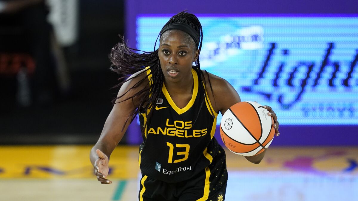 Los Angeles Sparks forward Chiney Ogwumike (13) controls the ball during a WNBA basketball game.