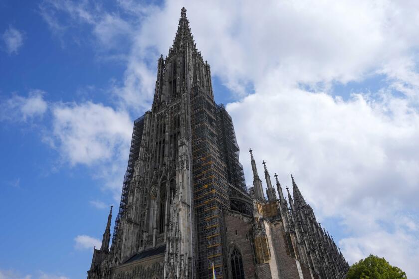 Exterior view of Ulmer Münster, the world's tallest church, in Ulm, Germany, Wednesday, Sept. 18, 2024. (AP Photo/Matthias Schrader)