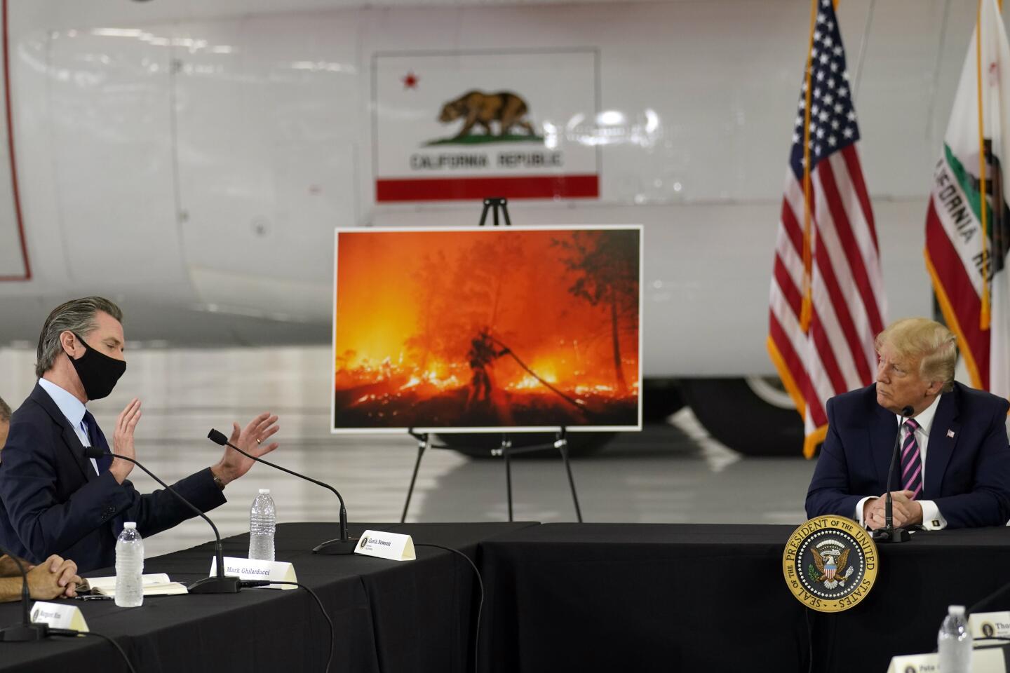 President Trump with California Gov. Gavin Newsom at a news briefing in Sacramento.