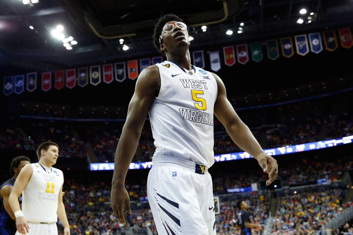 West Virginia forward Devin Williams had 17 points with nine rebounds in the Mountaineers' 68-62 victory over Buffalo in the second round of the NCAA tournament.