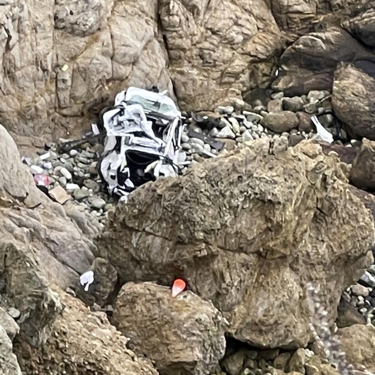 A Tesla that plunged off a Northern California cliff along the Pacific Coast Highway on Jan. 2, 2023.