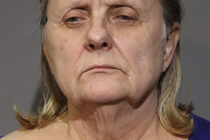 This booking image provided by the Chicago Police Department, shows Eva Bratcher, who has been accused of keeping her mother's dead body in a freezer for nearly two years while living in a nearby apartment. Bratcher appeared in court Thursday, Feb. 2, 2023, on charges of concealing her 96-year-old mother’s death and possessing a fraudulent identification card. (Chicago Police Department via AP)