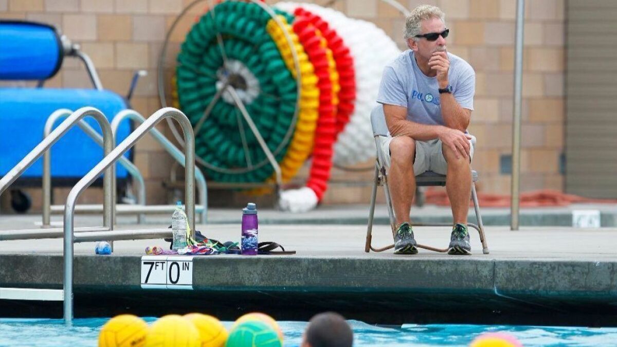 Former Coronado High School water polo coach Randy Burgess watches a practice on Sept. 19, 2016. Burgess ran the program for 33 years.