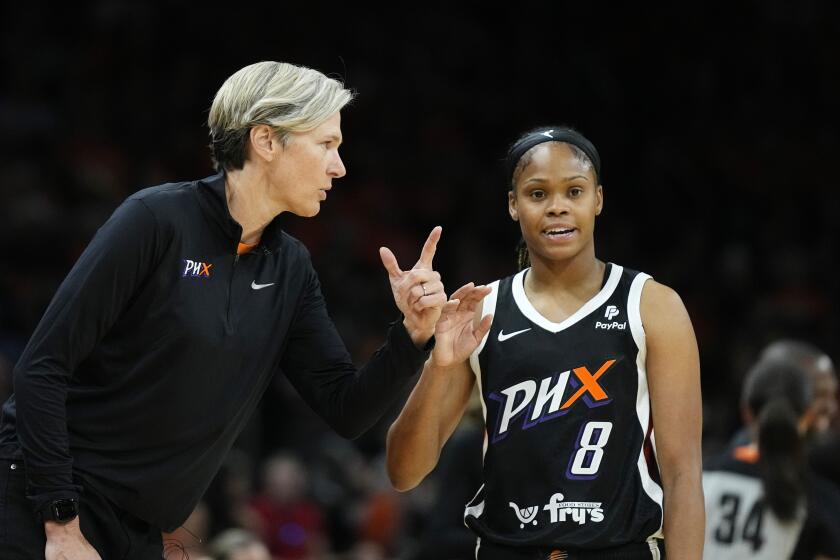 Phoenix Mercury head coach Vanessa Nygaard, left, talks with Mercury guard Moriah Jefferson (8) during the first half of a WNBA basketball game against the Chicago Sky, Sunday, May 21, 2023, in Phoenix. The Sky won 75-69. (AP Photo/Ross D. Franklin)