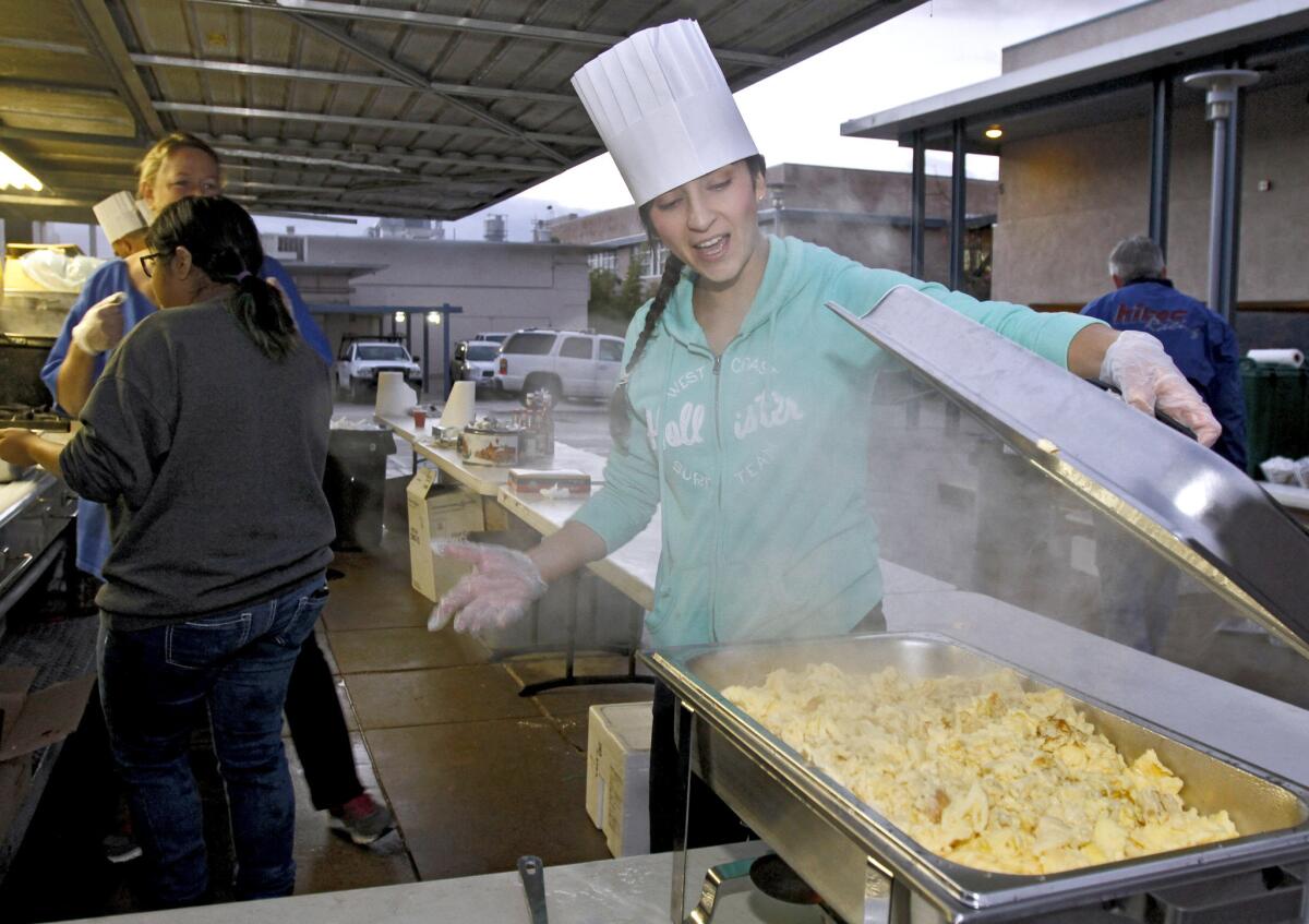 Ana Tovar volunteered to cook the eggs for the Crescenta Valley Town Council Pancake breakfast at Crescenta Valley High School on Saturday, Nov. 1, 2014.