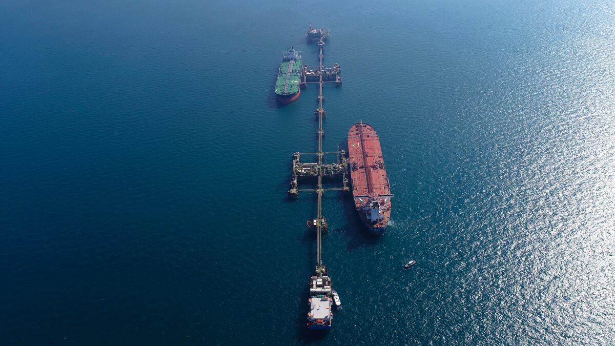 An aerial photo shows oil tankers loading crude oil at Iraq's Al-Basra Offshore Terminal in Basra.