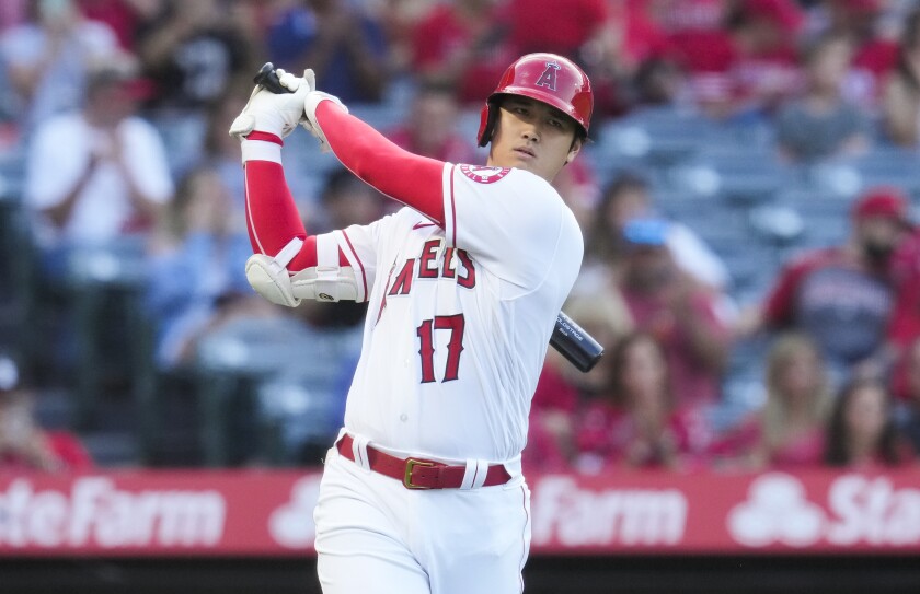 Angels designated hitter Shohei Ohtani warms up before an at-bat against the Baltimore Orioles on Friday.
