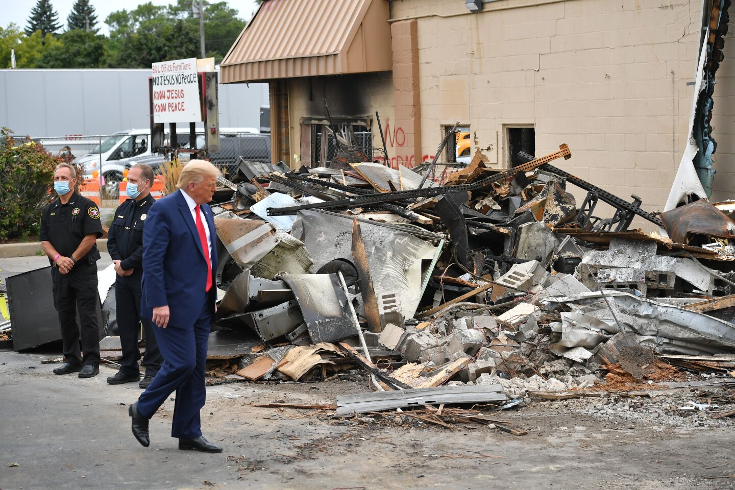 US President Donald Trump tours an area affected by civil unrest in Kenosha, Wisconsin on September 1, 2020. - Trump visited Kenosha, the Wisconsin city at the center of a raging US debate over racism, despite pleas to stay away and claims he is dangerously fanning tensions as a reelection ploy. (Photo by MANDEL NGAN / AFP) (Photo by MANDEL NGAN/AFP via Getty Images)